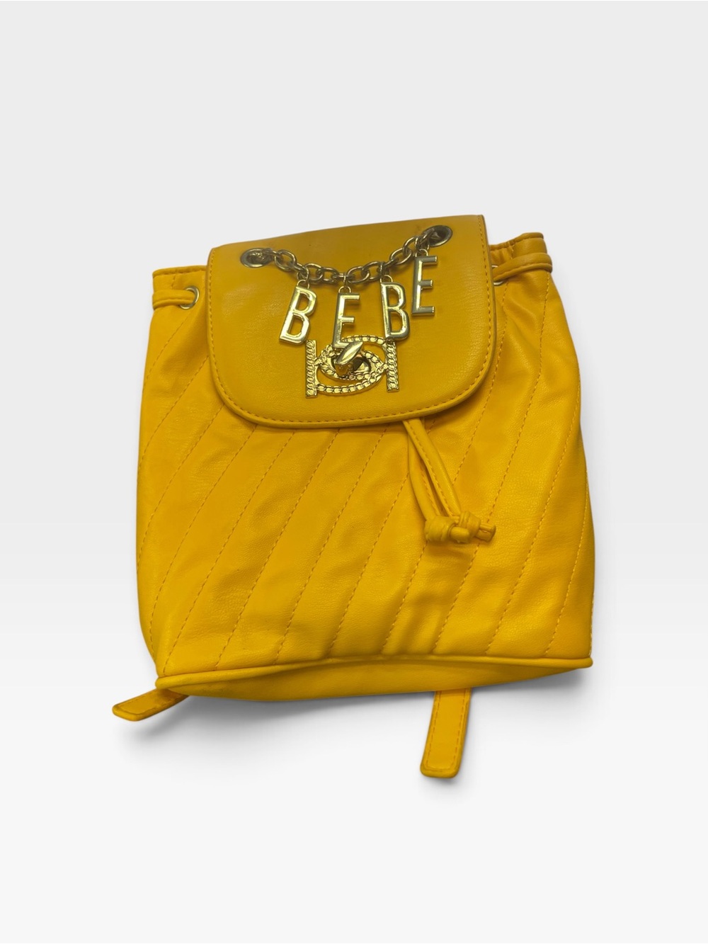 bebe Yellow Quilted Drawstring Backpack with Gold Logo Chain